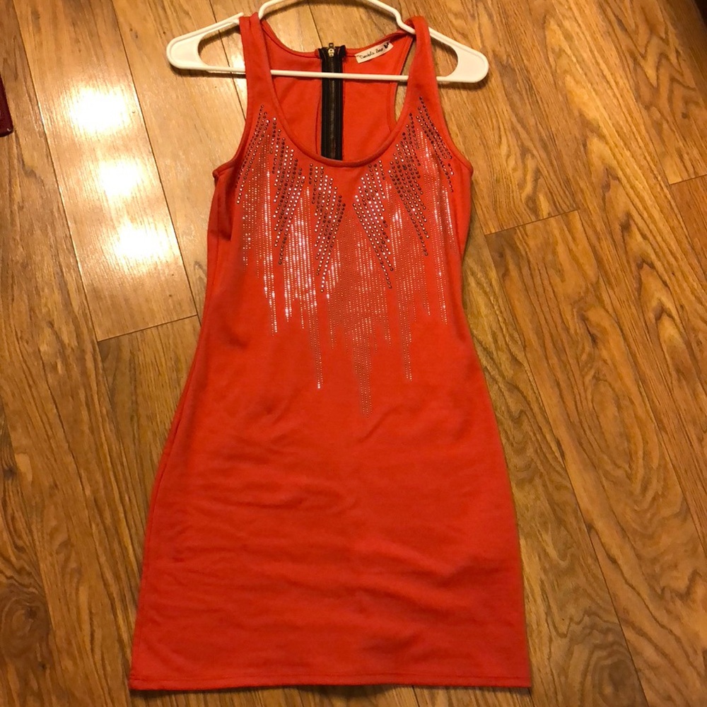 Tight, rhinestoned dress